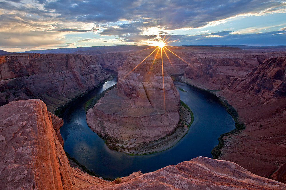 The Colorado River meanders through Horseshoe Bend, near Page, Arizona. Technical information:  Canon 5D Mark II, 16-35mm lens at 16mm, f/22 @ 1/5 second, no filters, tripod and cable release, basic post-processing in CS5 Adobe Photoshop